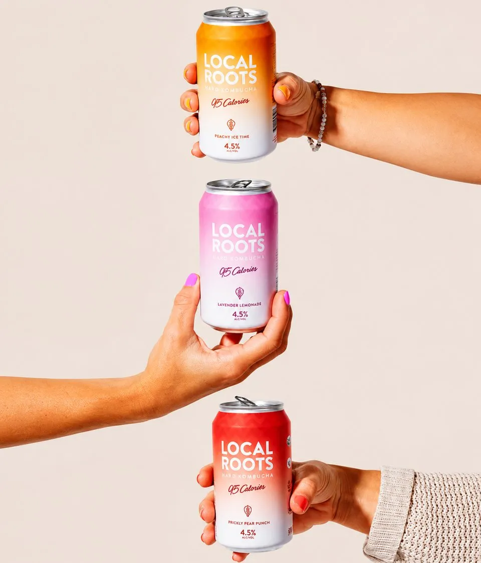 Three colourful drink cans presented as products on an online store