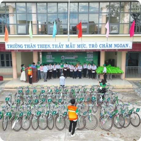 Rows of new bicycles in the schoolyard, ready to be given away